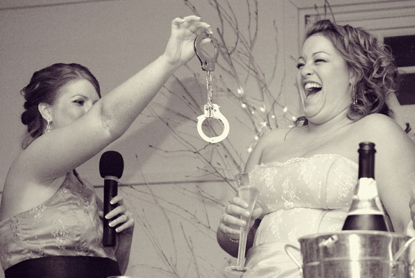 Bride and Bridesmaid with handcuffs