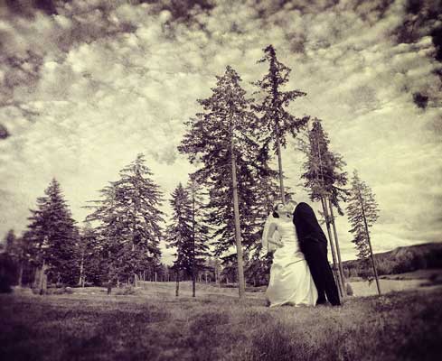 Bride and Groom under the bright sky